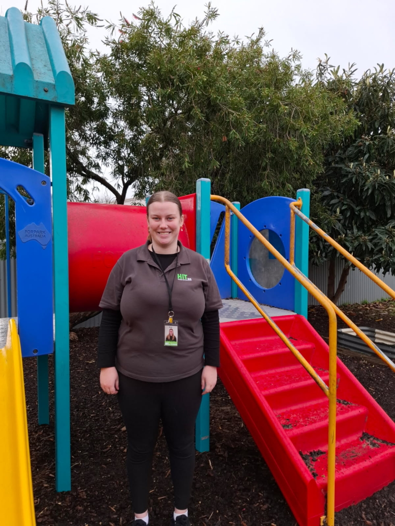 Hitsa student next to playground