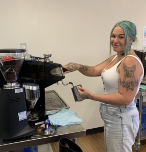 Student pictured at coffee machine